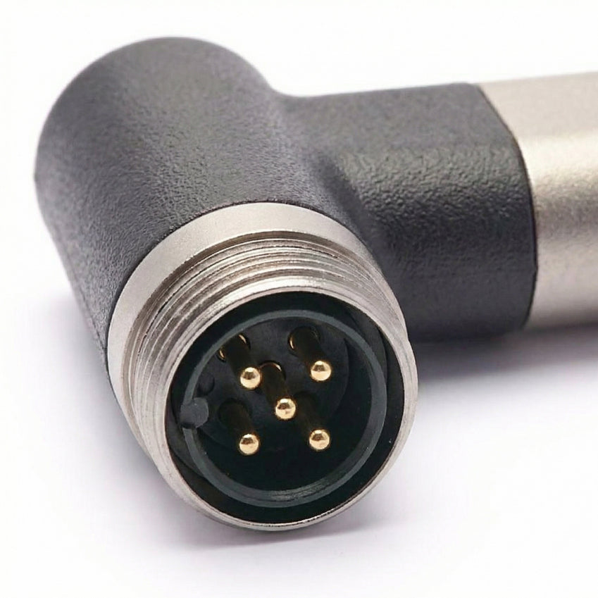 Close-up of a black angled multi-pin cable connector with gold-plated pins