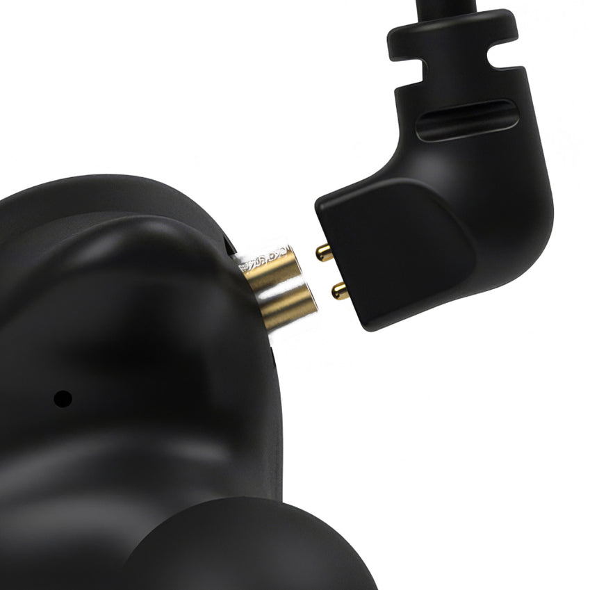 Close-up of black in-ear monitors and their detachable cable connector