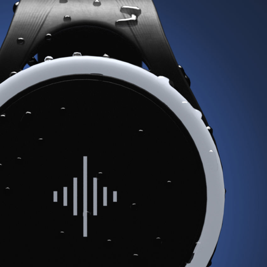Close-up of a black round wrist device with a white outer ring and sound-wave symbol