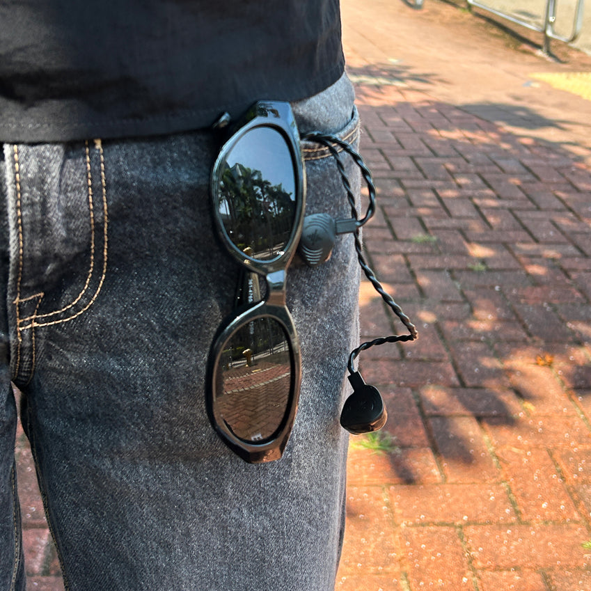 Wave Pro 2 earphones carried in a jeans pocket